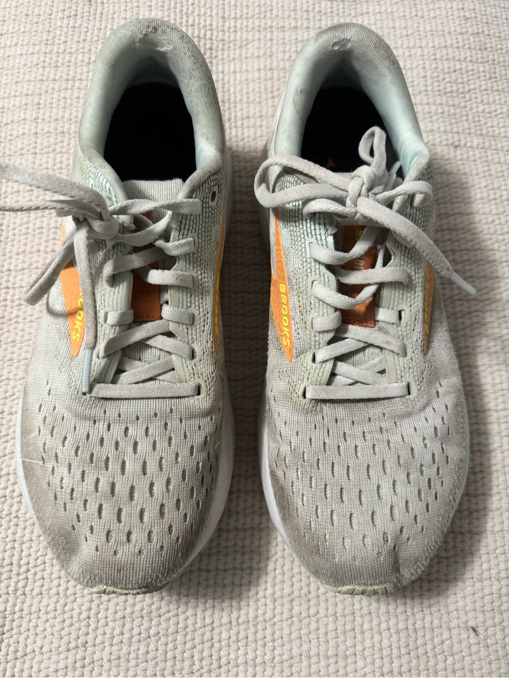 Brooks Light Gray Running Shoes with Orange Accents